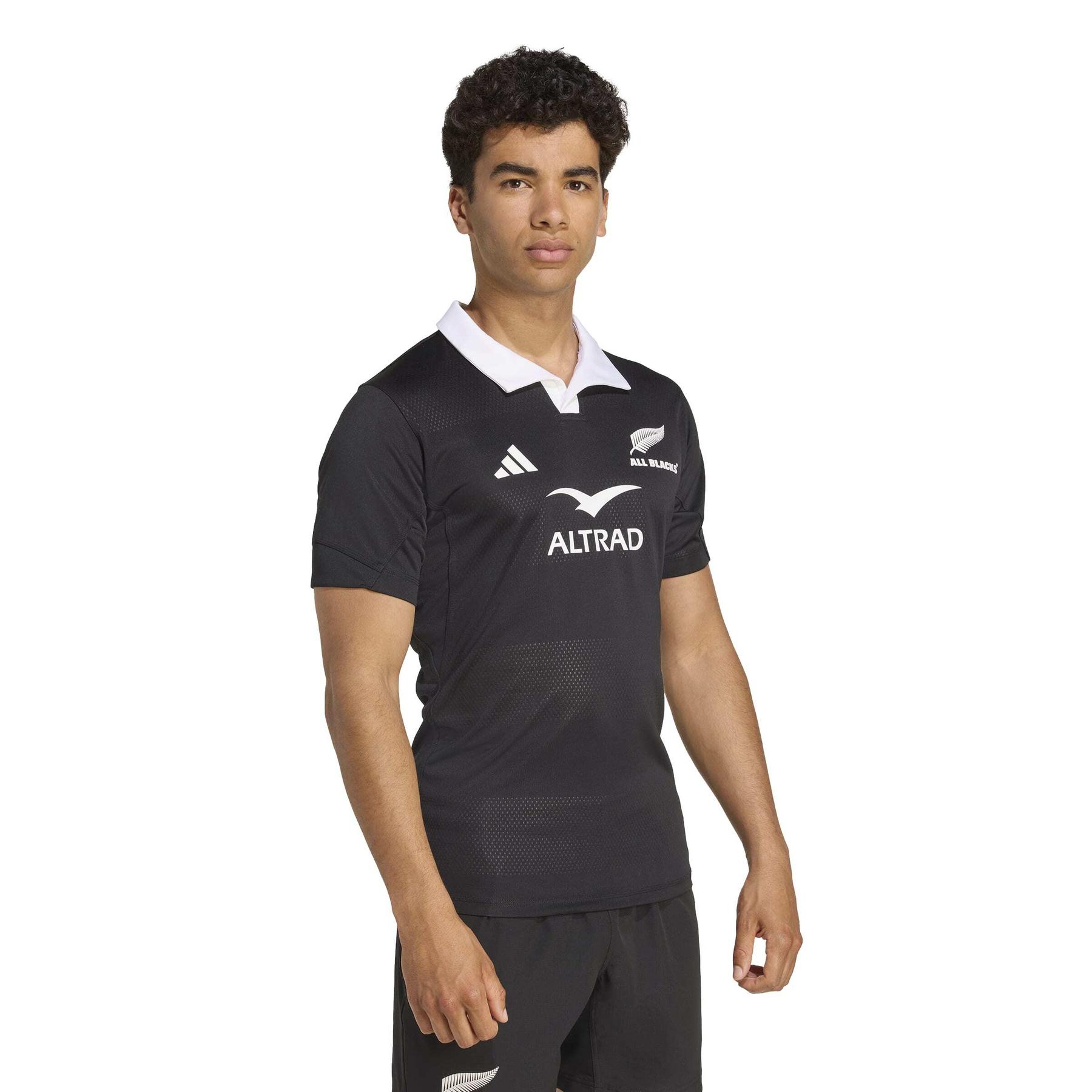 product/a/d/adidas_jl8025_5_apparel_on_model_walking_view_white.jpg