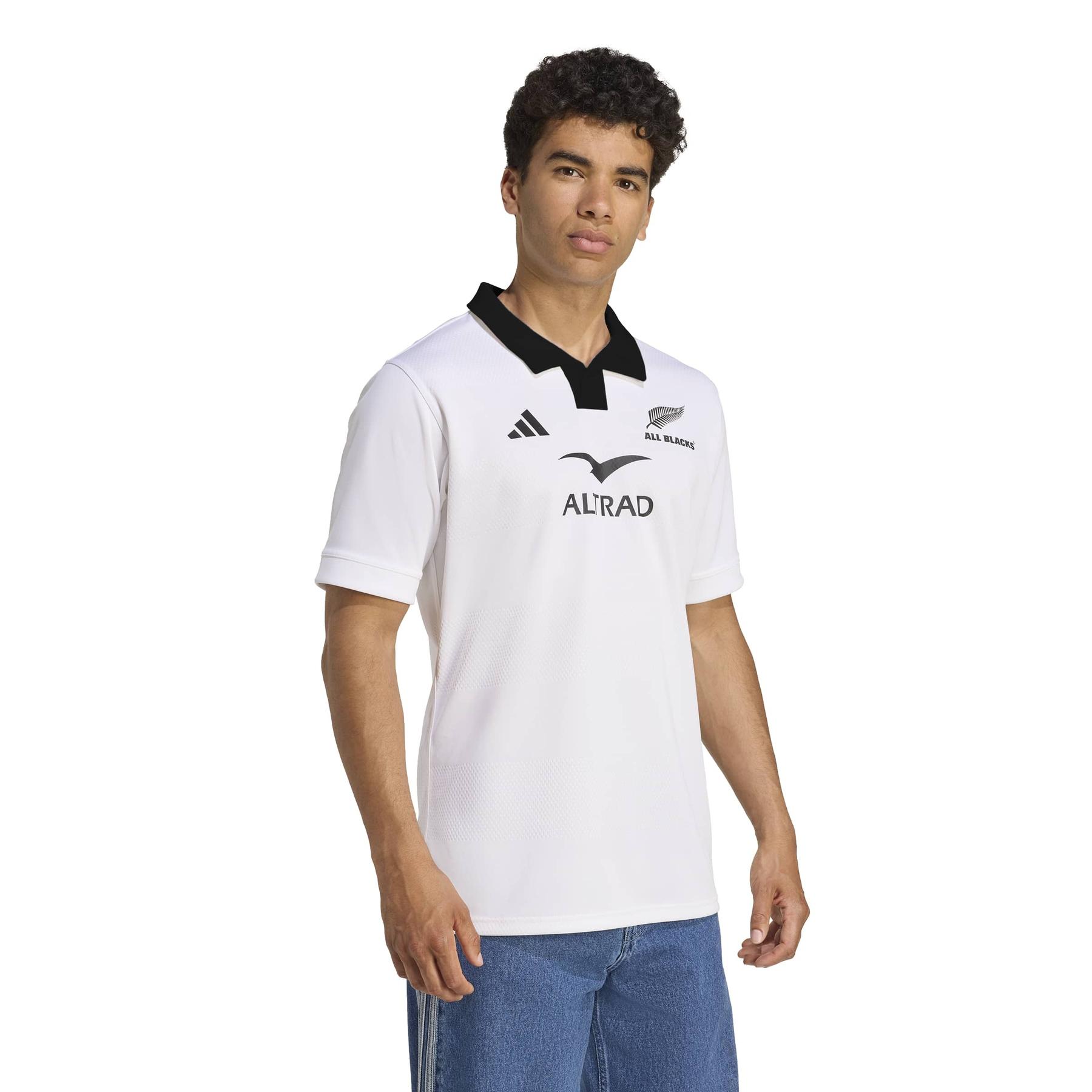 product/a/d/adidas_jl8031_5_apparel_on_model_walking_view_white.jpg